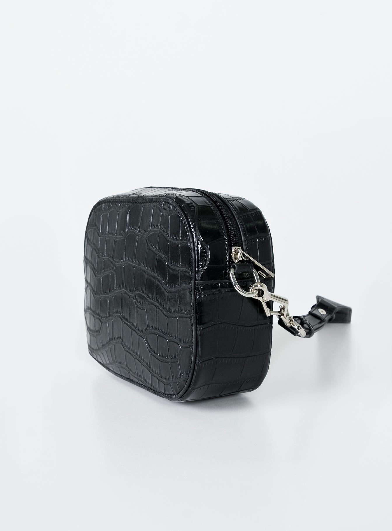 Crossbody bag  Princess Polly Exclusive Faux leather material  Croc print  Removable & adjustable crossbody strap  Silver-toned hardware  Two internal pockets  Flat base 