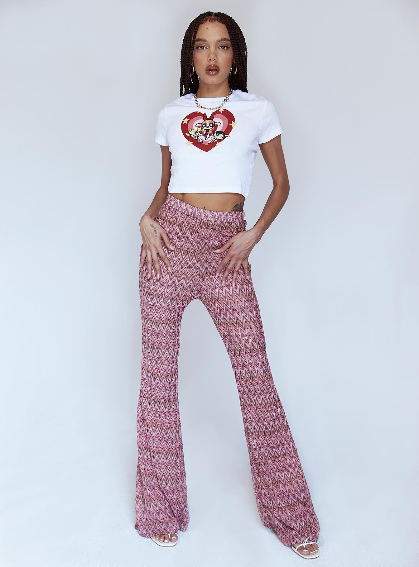 front view of model wearing Princess Polly Karmen Chevron Knit Flare Pants Pink 