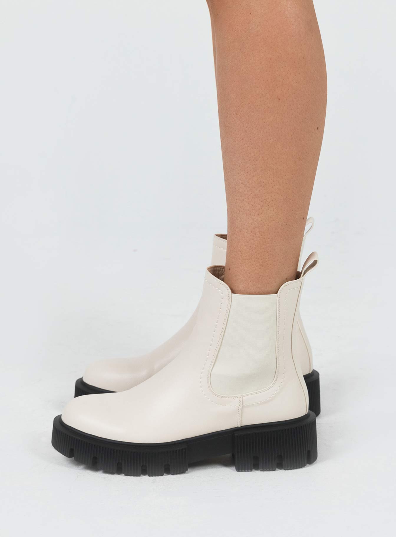 Boots Boots Faux leather material Platform base Rounded toe Elasticated gussets Pull tab at back