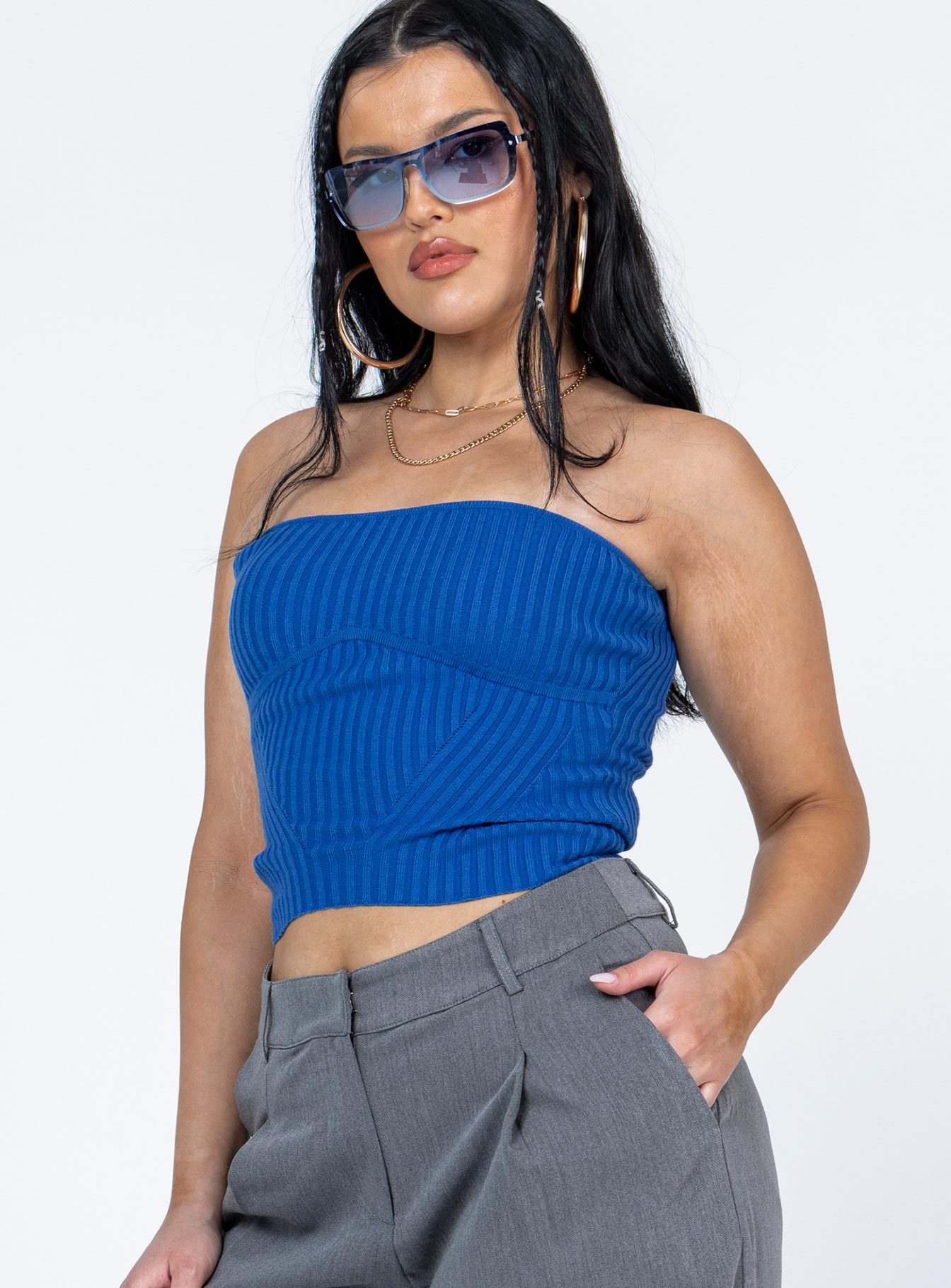 side view of model wearing Princess Polly Royce Strapless Top Blue Sleeveless 