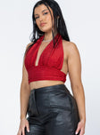 Red crop top Glitter material Fixed halter neck Plunging neckline Ruched under bust band