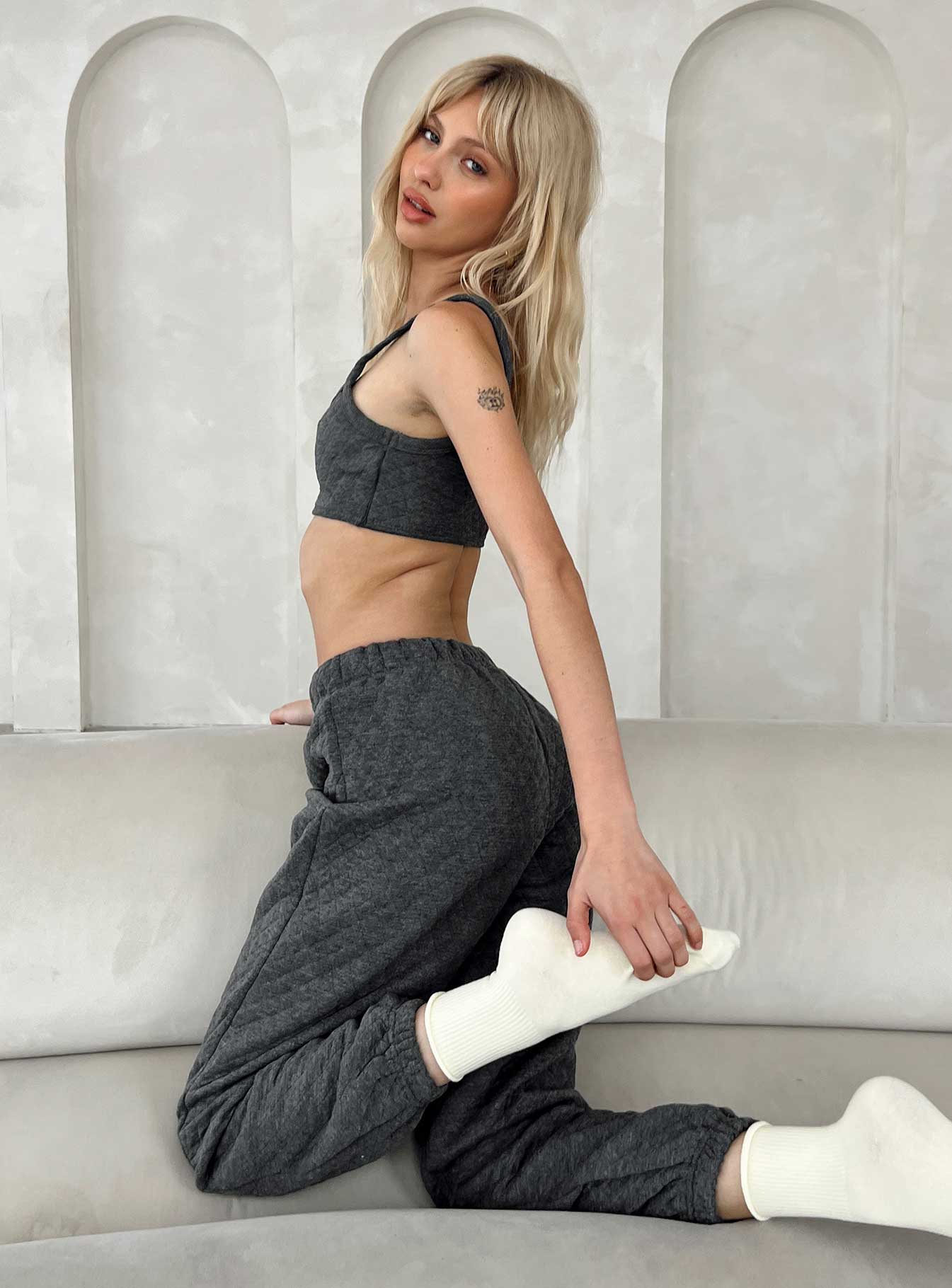 Matching set Quilted material  Crop top Invisible zip fastening at side High waisted pants  Elasticated waistband & cuffs