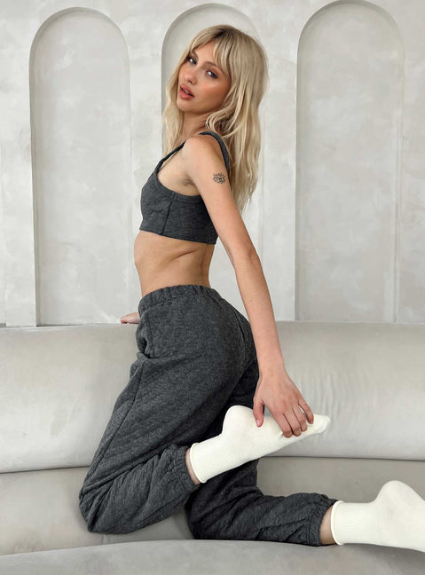 Matching set Quilted material  Crop top Invisible zip fastening at side High waisted pants  Elasticated waistband & cuffs