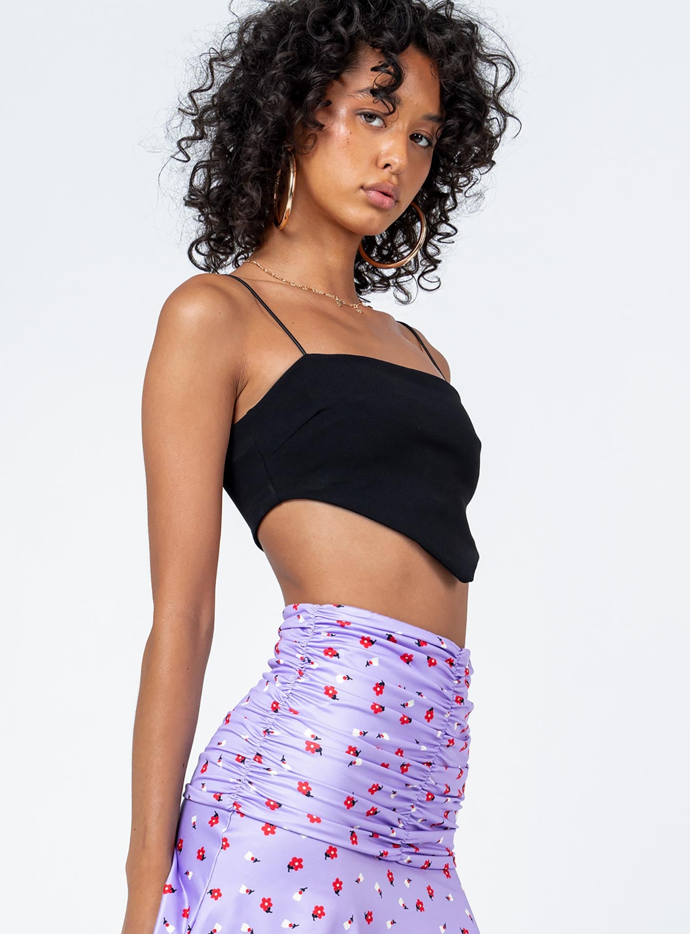 side view of model wearing Princess Polly McKinnon Top Black Sleeveless Square Neck 