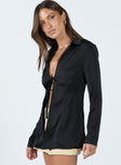 Long sleeve shirt Silky material Classic collar V-neckline Tie fastening at front Open front design