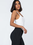 side view of model wearing Princess Polly Lindsey Bodysuit White Sleeveless Scoop Neck 