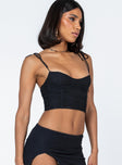 side view of model wearing Princess Polly Stephano Top Black Sleeveless Sweetheart 