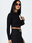 Front view of model wearing  front Princess Polly Full Sleeves High Neck  Arthur Long Sleeve Top Black