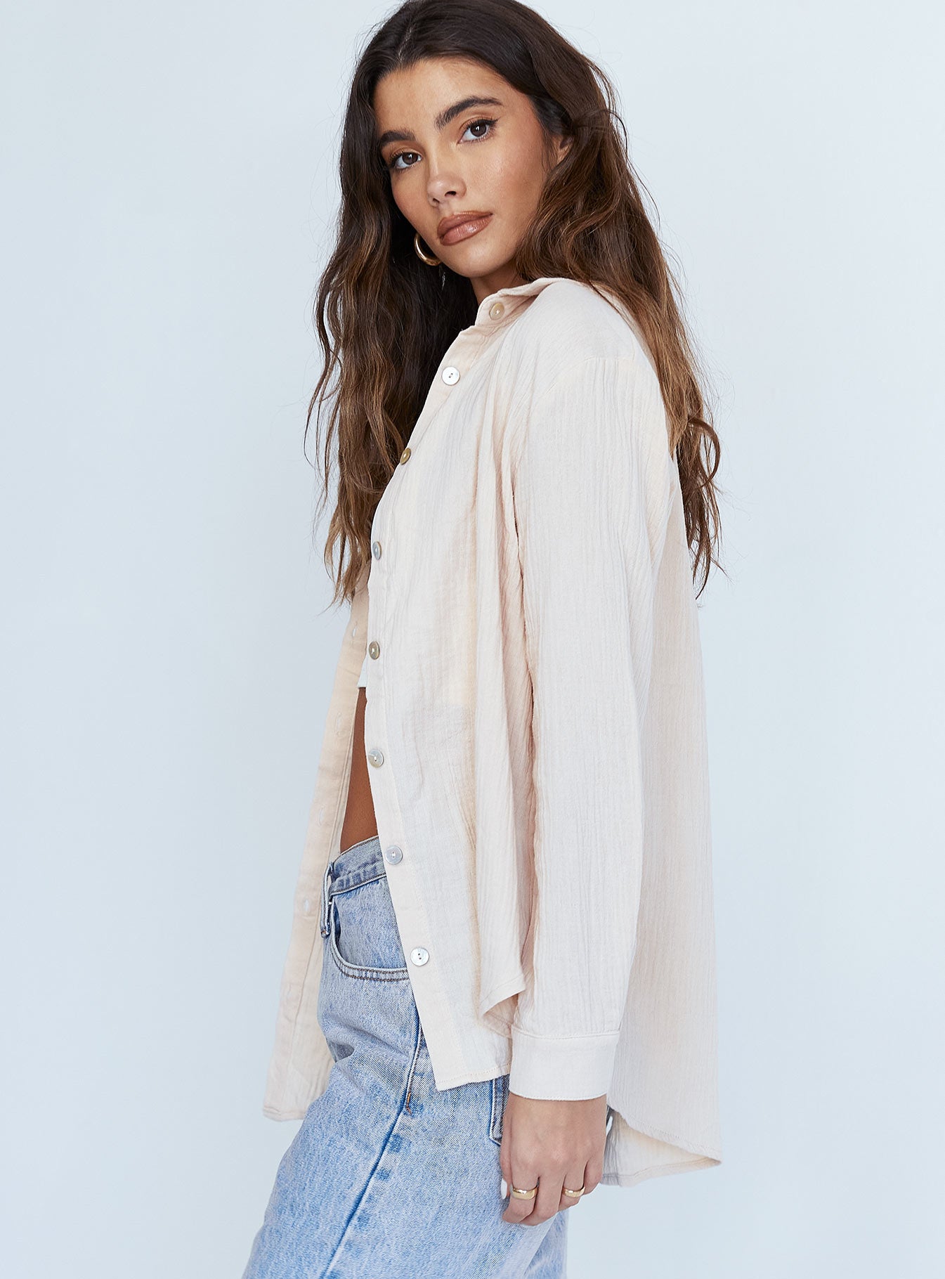side view of model wearing Princess Polly Mahalia Shirt Beige 