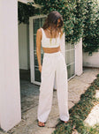 Matching set Linen material Crop top Fixed straps Invisible zip fasting at side High waisted pants Wide relaxed leg Belt loops at waist