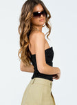 Strapless top Zip fastening at back  Slight stretch  Lined bust 