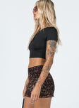   side view of model wearing Princess Polly Lidya Ultra Micro Mini Skirt Leopard 