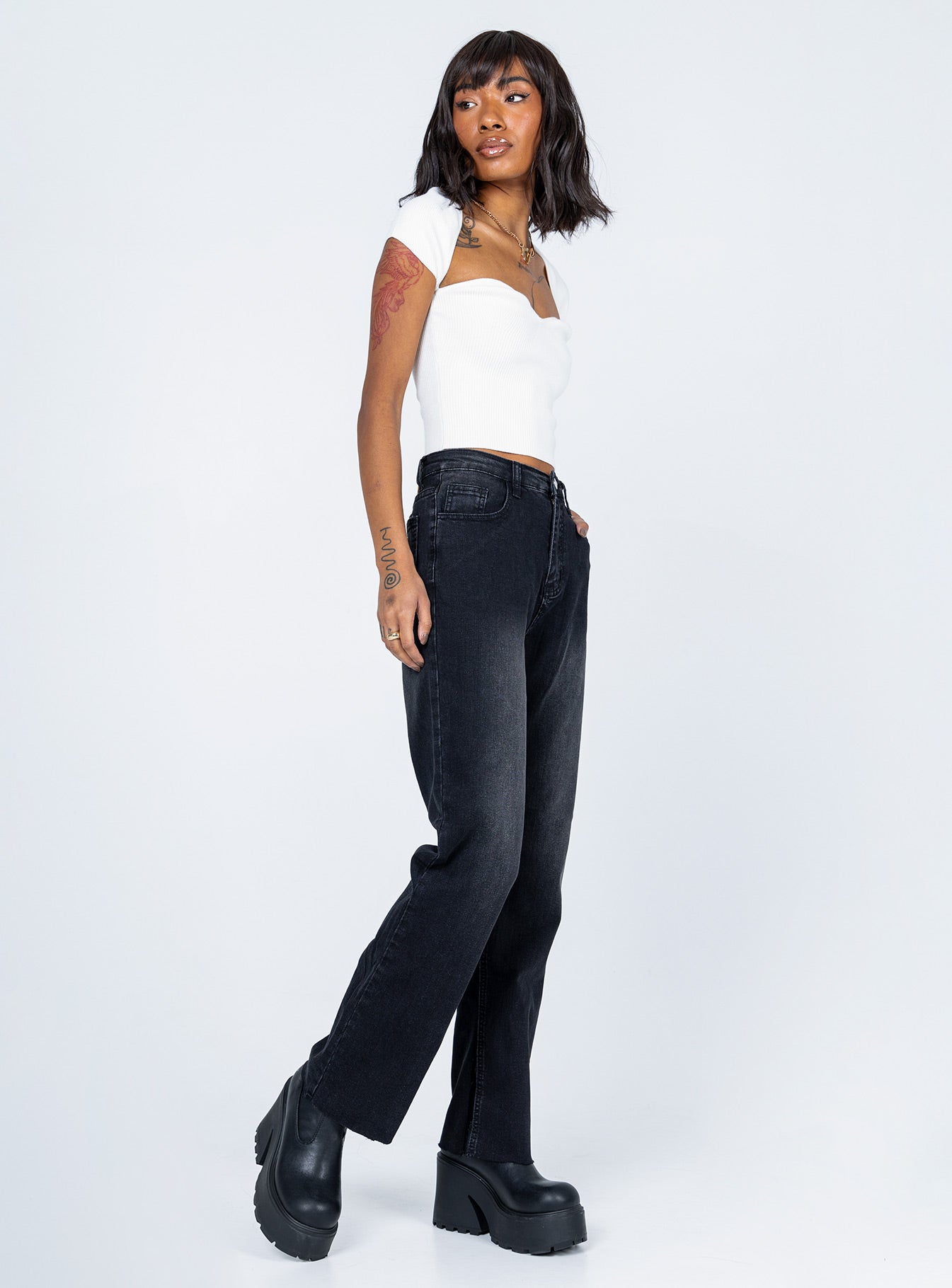 side view of model wearing Princess Polly Miller Denim Jeans Black High Waisted 