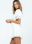 White romper Elasticated shoulders Puff sleeves  Shirred bust Double back tie fastening  Low back 