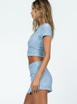 Blue matching set Detailed material  Cropped tee Low-rise mini skirt  Elasticated waistband  Side slit 