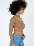 side view of model wearing Princess Polly Gabriella Long Sleeve Top Beige 