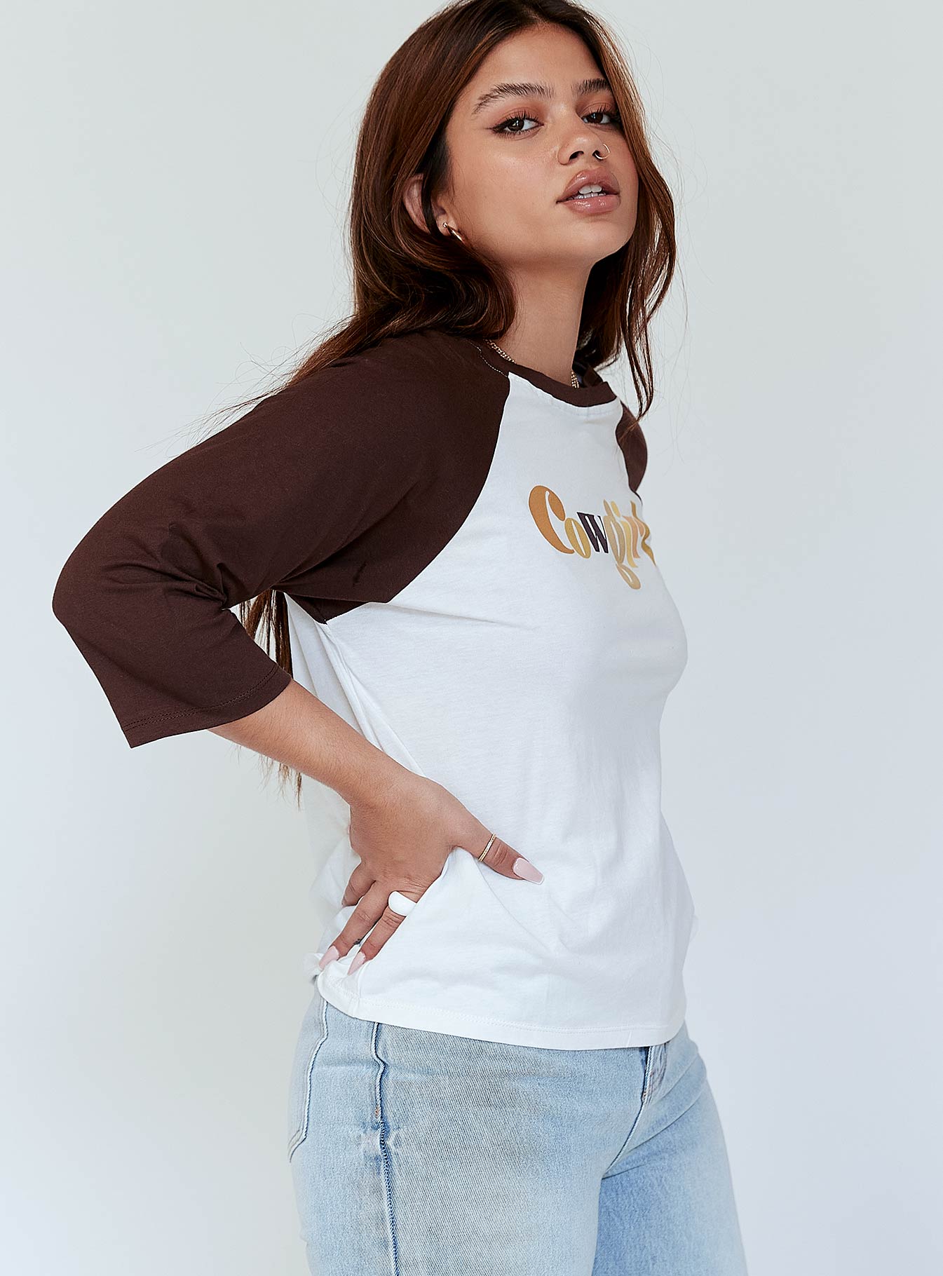 side view of model wearing Princess Polly Motel Nexo Tee Cowgirl Brown 