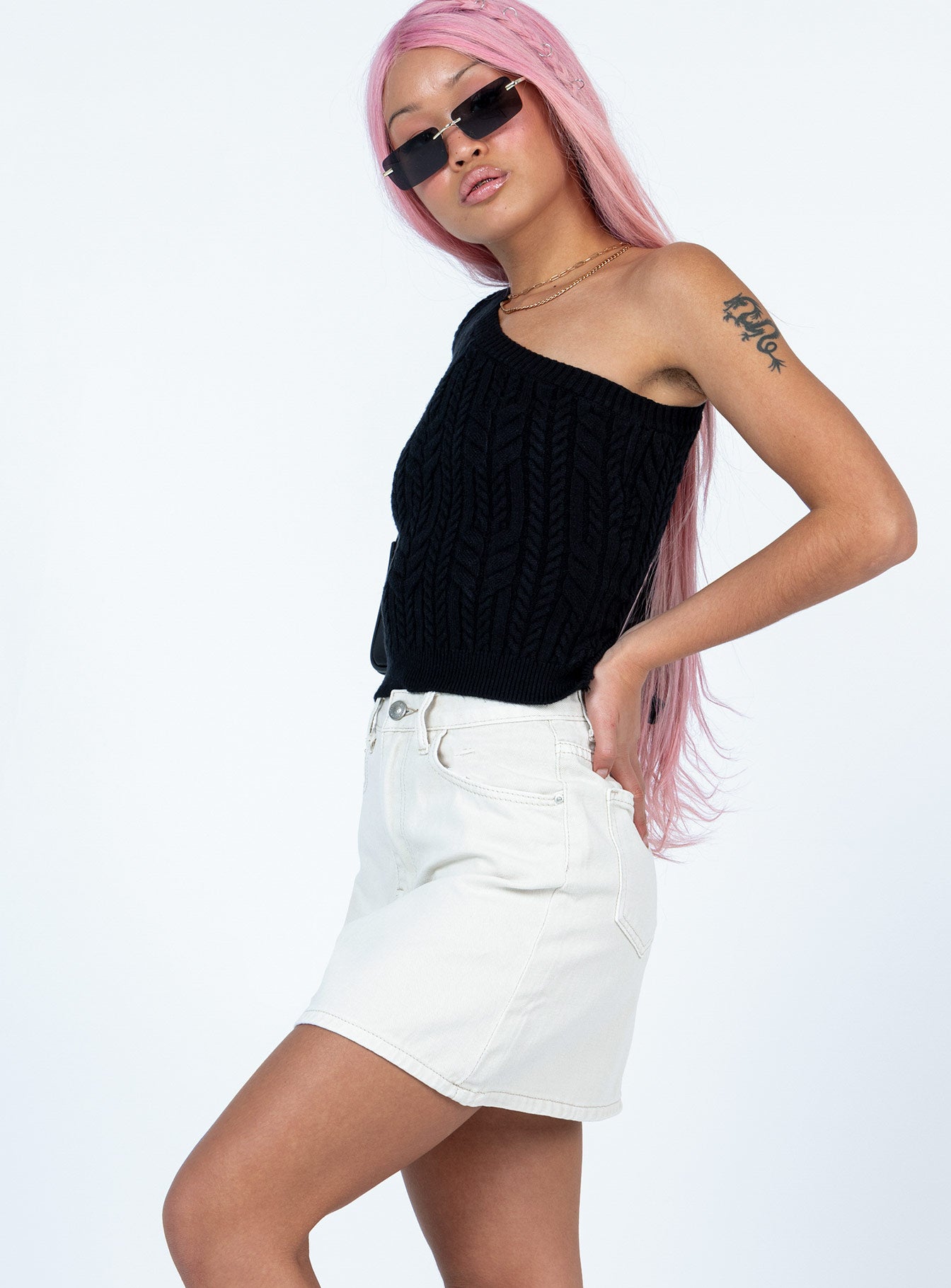   side view of model wearing Princess Polly Edyn Mini Skirt White Mini Skirts 