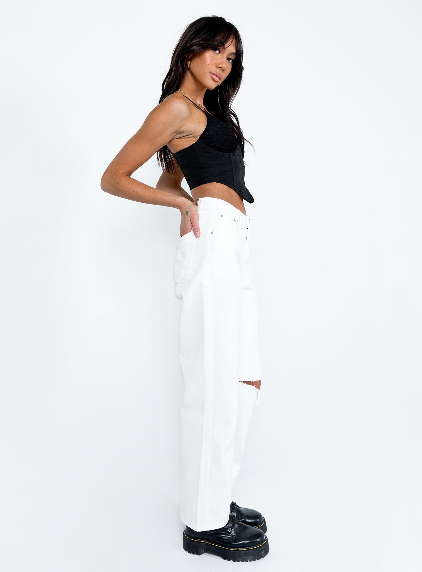 side view of model wearing Princess Polly Sevina Wide Leg Denim Jeans White High Waisted 