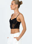 Crop top Sheer mesh material  Lace detail  Adjustable shoulder straps Wired cups 