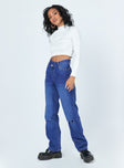 side view of model wearing Princess Polly Dinant Cross Over Denim Jeans Mid Rise 