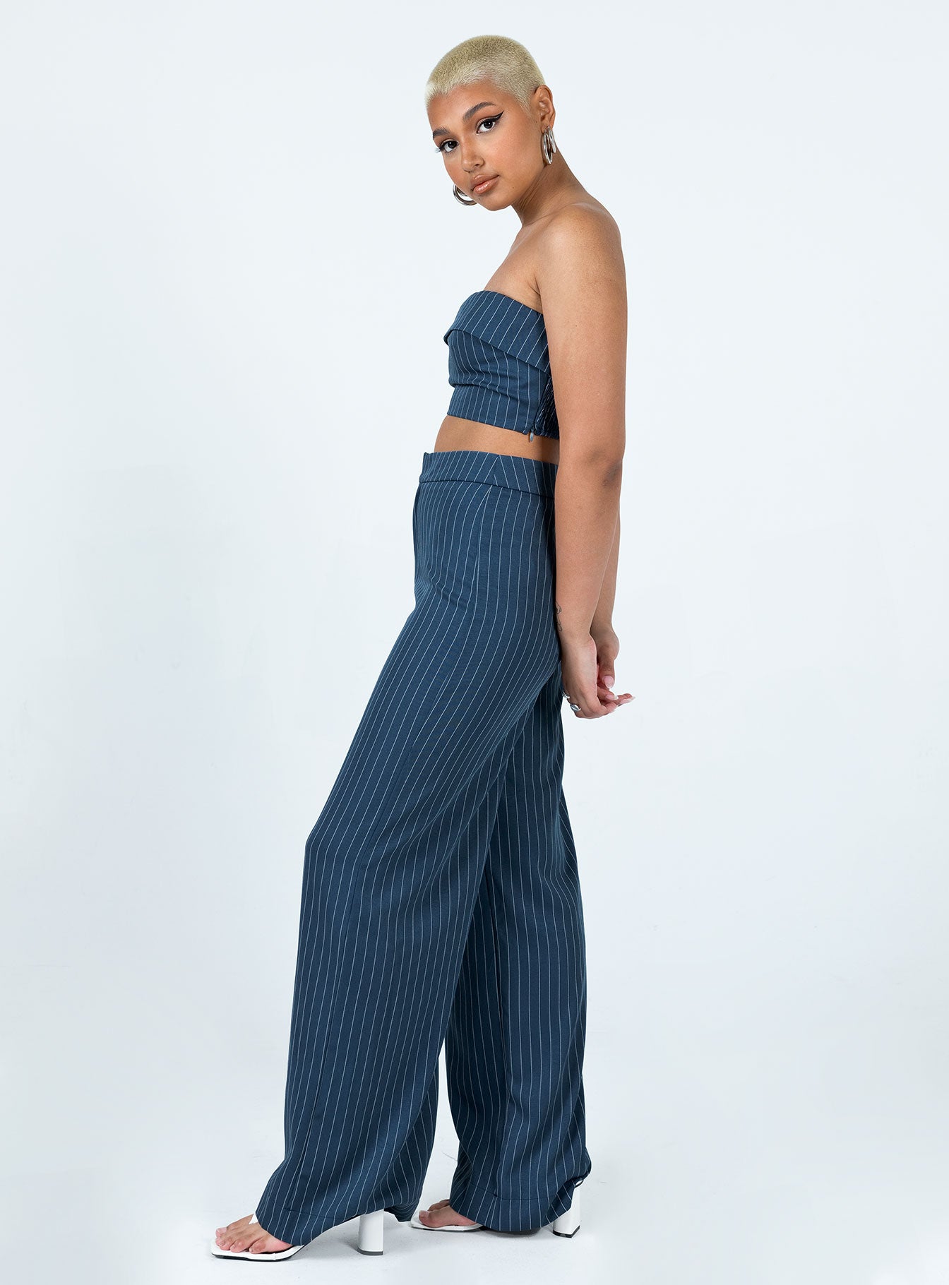 Matching set Pinstripe print Crop top Folded neckline Inner silicone strip at bust Invisible zip fastening at side Shirred back panel Tailored pants Hook & zip fastening Wide leg