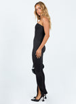 Strapless jumpsuit Inner silicone strip at bust Invisible zip fastening at back Split at cuff Slim leg 