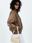 Jacket Faux leather material Classic collar Zip & press button fastening at front Elasticated hem & cuffs Twin hip pockets