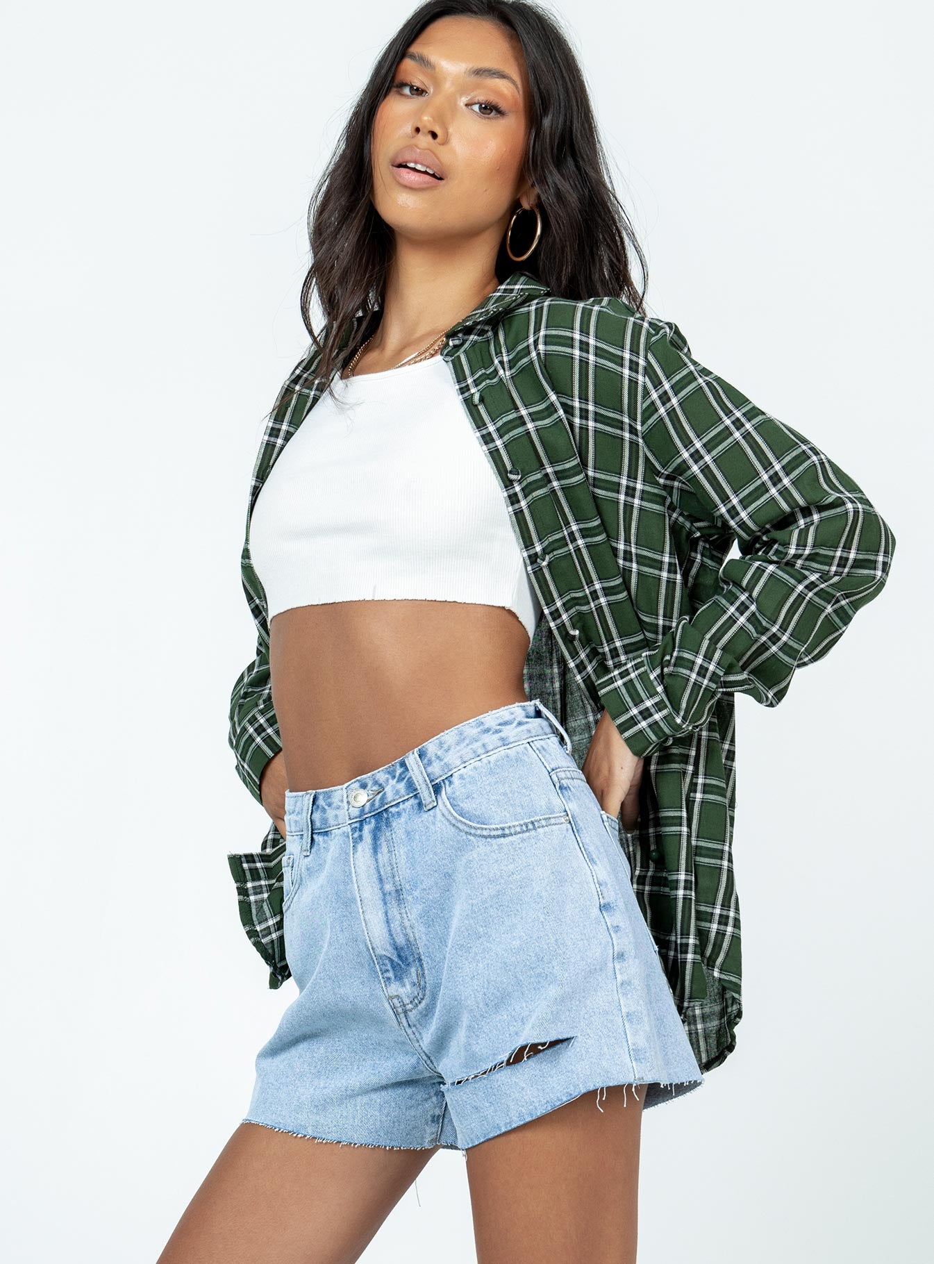 side view of model wearing Princess Polly Camari Denim Shorts Light Wash 