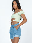 Denim shorts Zip & button fastening  Belt looped waist  Pleated waist  Twin hip pockets  Fixed rolled hem  Branded patch on back 