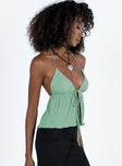 Sage crop top Crinkle material  Halter neck tie fastening  Tie fastening at bust  Open front  Good stretch  Lined bust 