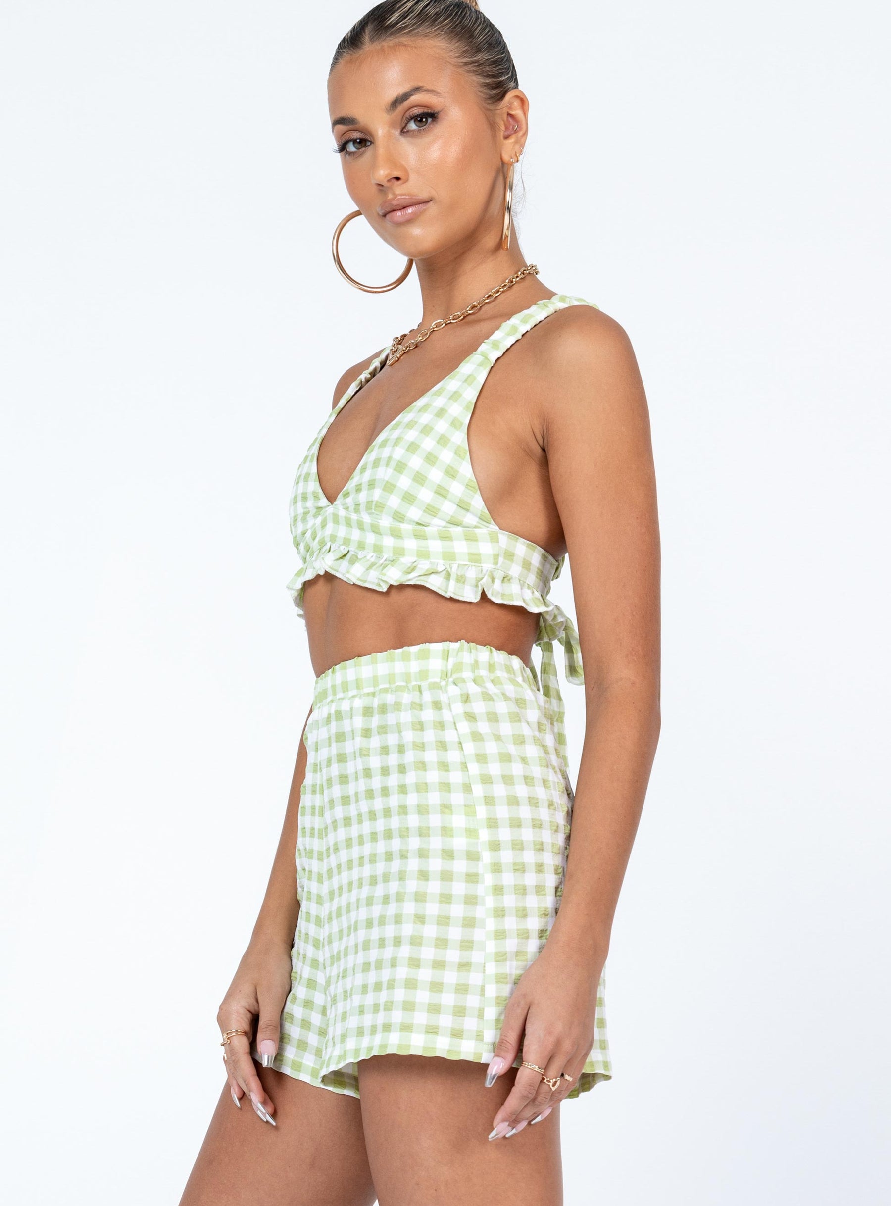 Matching set Check print  Crop top Elasticised straps  Frill hem  Back tie fastening High waisted shorts  Elasticated waistband 