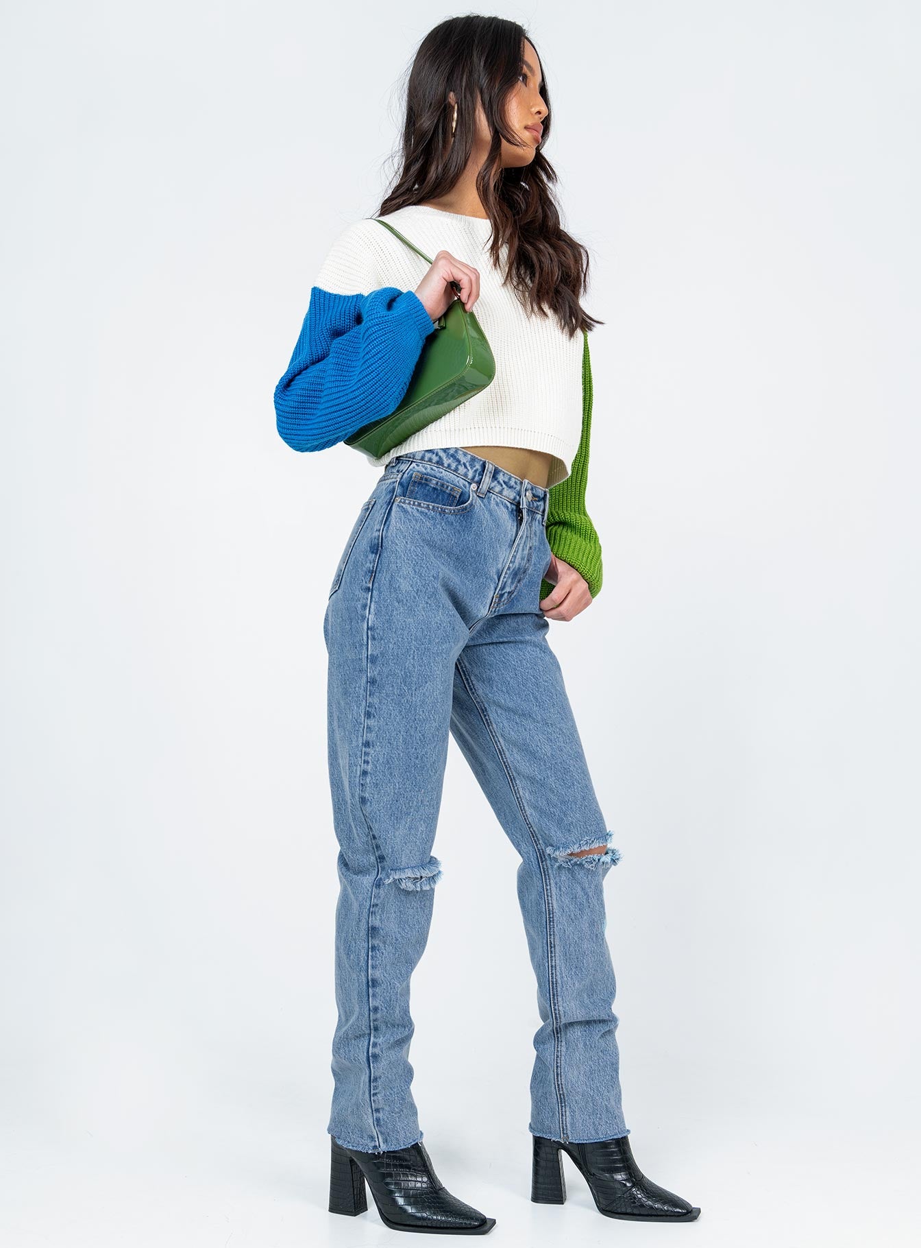 side view of model wearing Princess Polly Bolonia Skinny Denim Jeans Mid Rise 