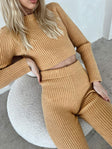 Matching set Knitted material Crop top  Scoop neckline High waisted pants Elasticated waistband  Slim flares