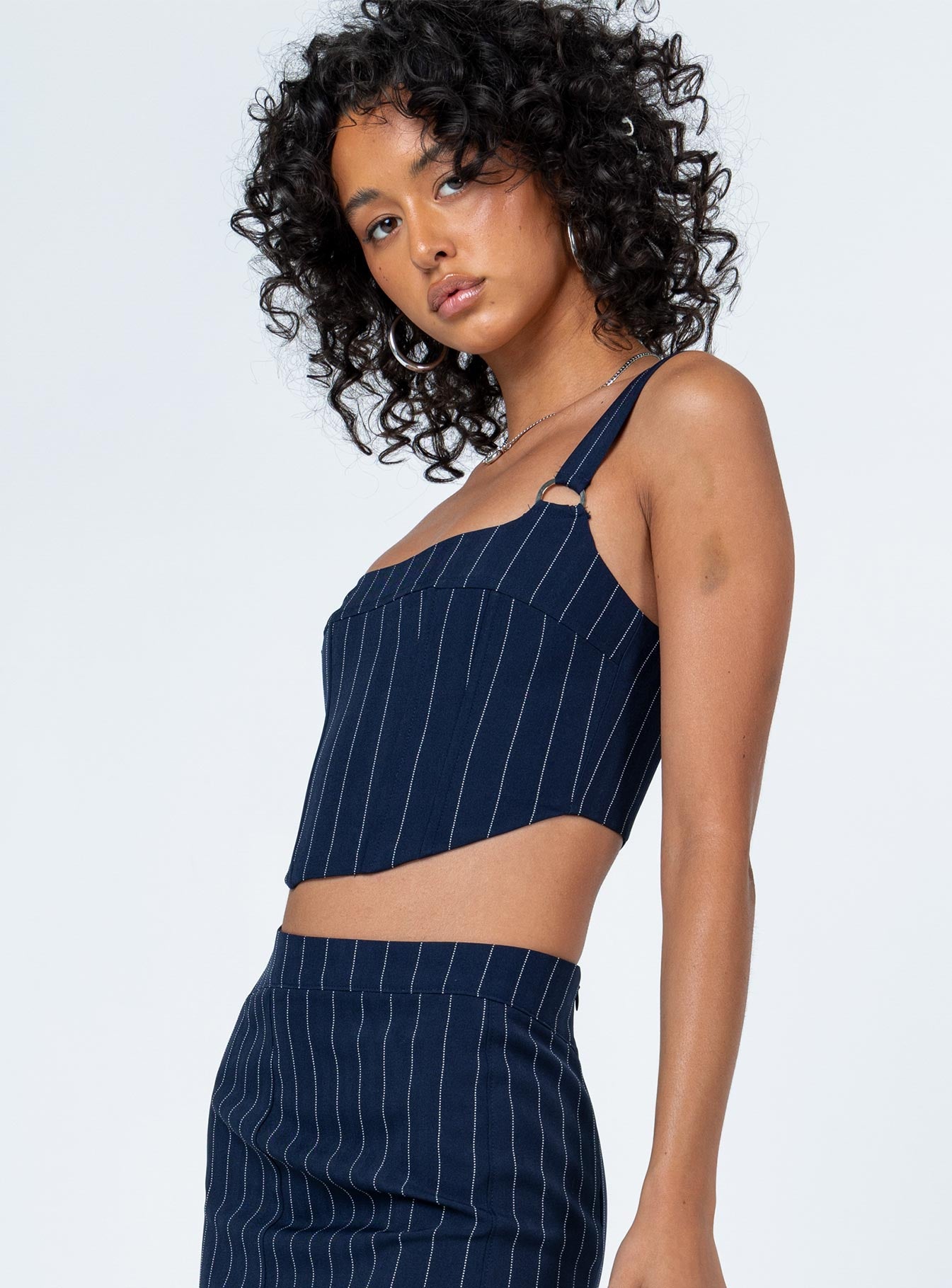 side view of model wearing Princess Polly Josie Top Blue Sleeveless Square Neck 