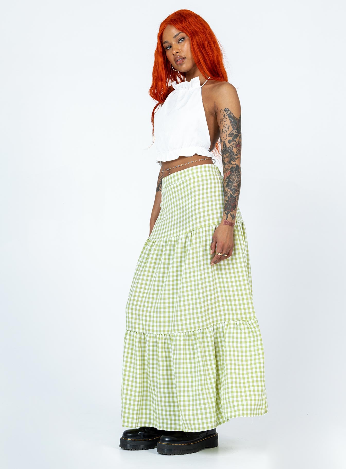   side view of model wearing Princess Polly Rebeccah Maxi Skirt Green Maxi 