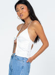 Crop top Silky material Halter neck tie fastening Elasticated back Single-button fastening at bust