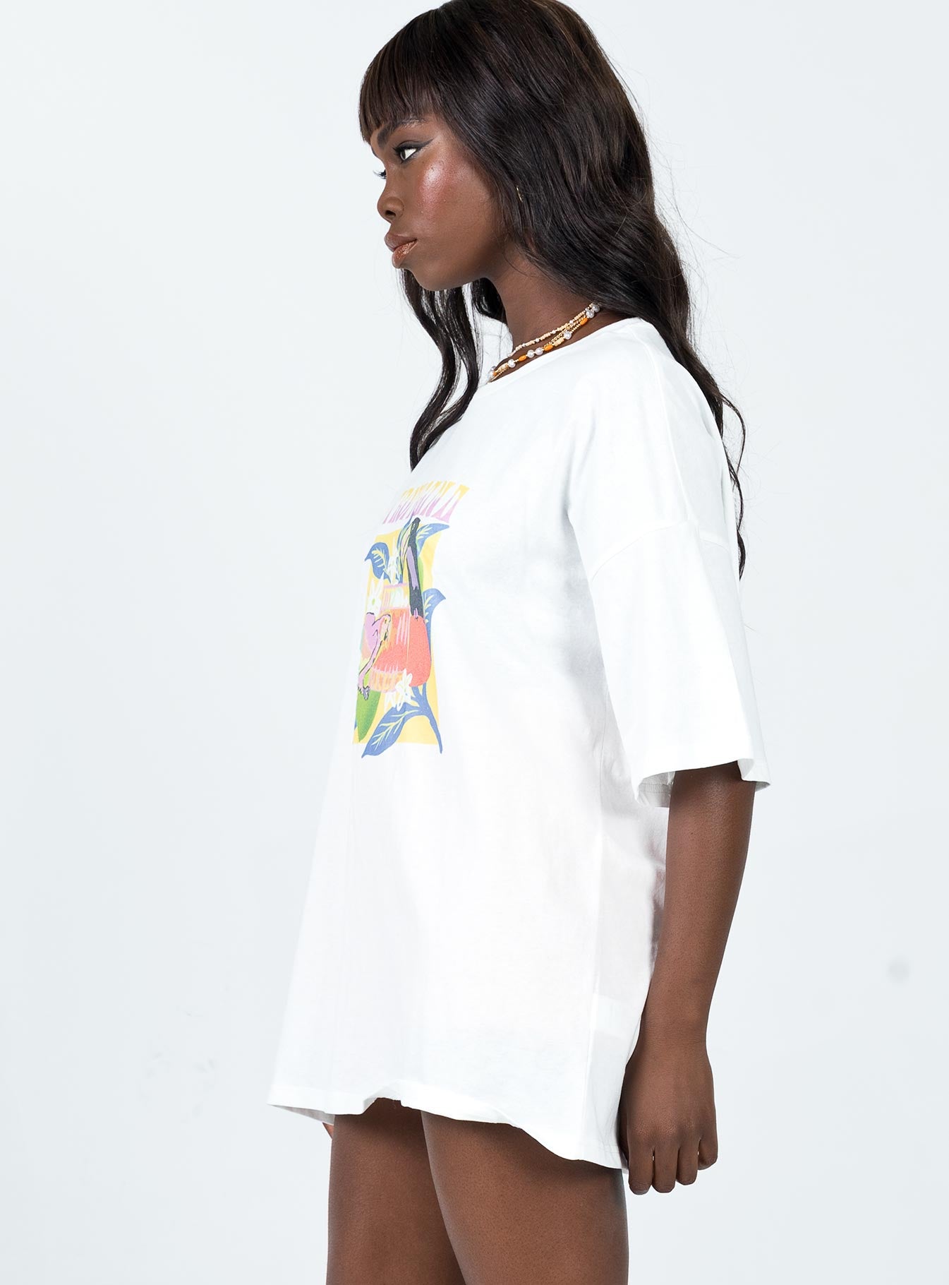 side view of model wearing Princess Polly Tropicana Oversized Tee White 
