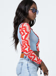 side view of model wearing Princess Polly Division Long Sleeve Top Multi 