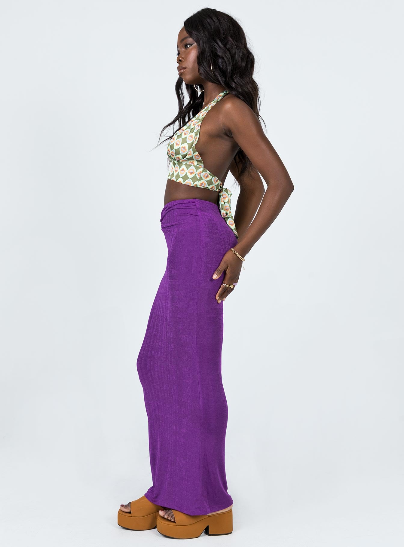   side view of model wearing Princess Polly Danna Maxi Skirt Purple 