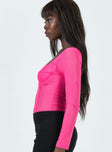 side view of model wearing Princess Polly Leonie Bodysuit Pink Full Sleeves Sweetheart 