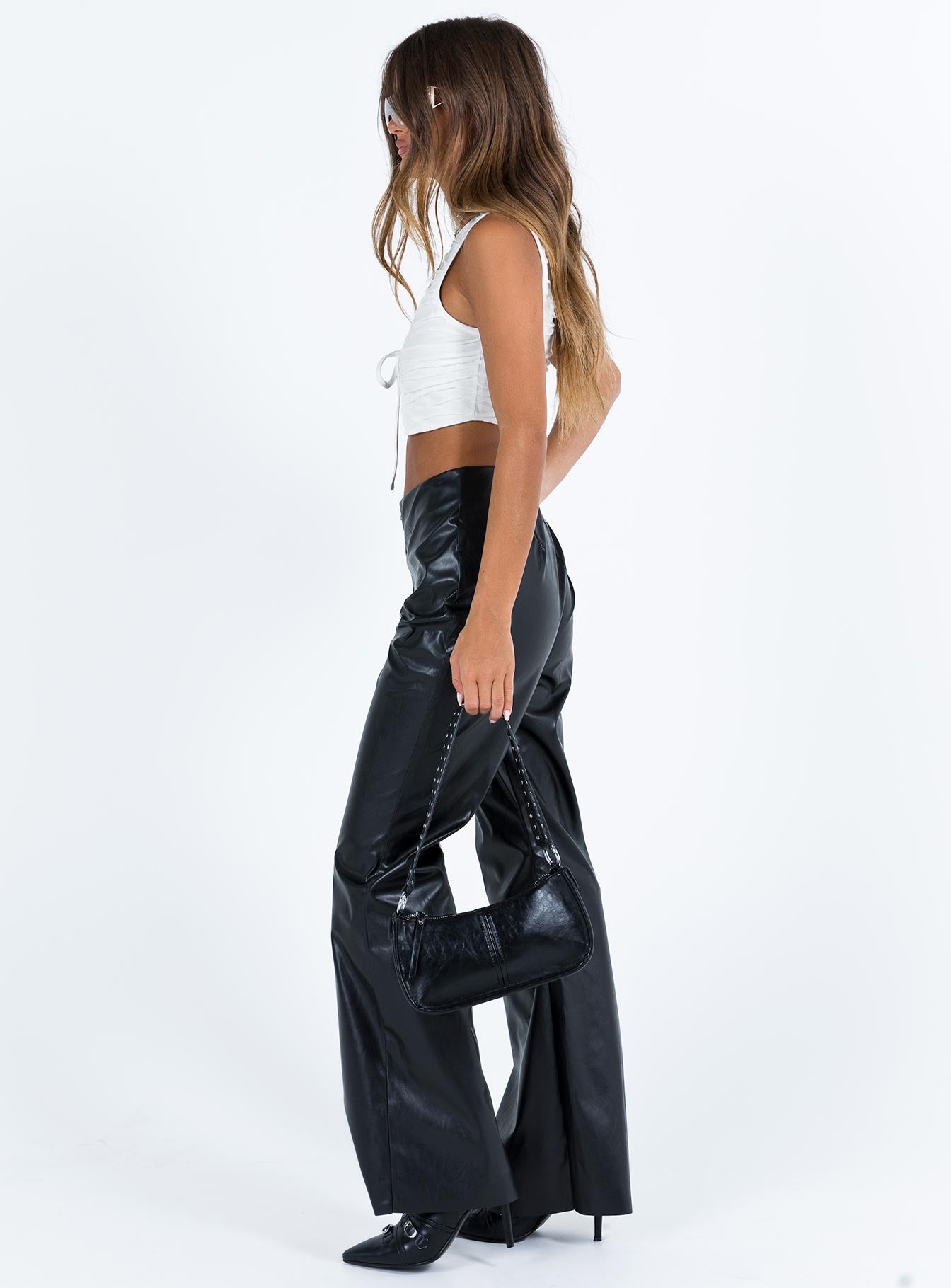 Front view of model wearing  front Princess Polly High Waisted Pants  Valla Faux Leather Flare Pants Black