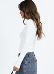 White long sleeve top Ribbed material Mock neck Good stretch Unlined