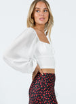 Long sleeve crop top Mesh material Wide neckline Tie front fastening Sheer puff sleeves Elasticated shoulders & cuffs Ruching throughout Invisible zip fastening at side Good stretch Partially lined