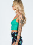 side view of model wearing Princess Polly Brentwood Top Green Sleeveless Sweetheart 