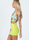   side view of model wearing Princess Polly Niku Mini Skirt Apple Green 