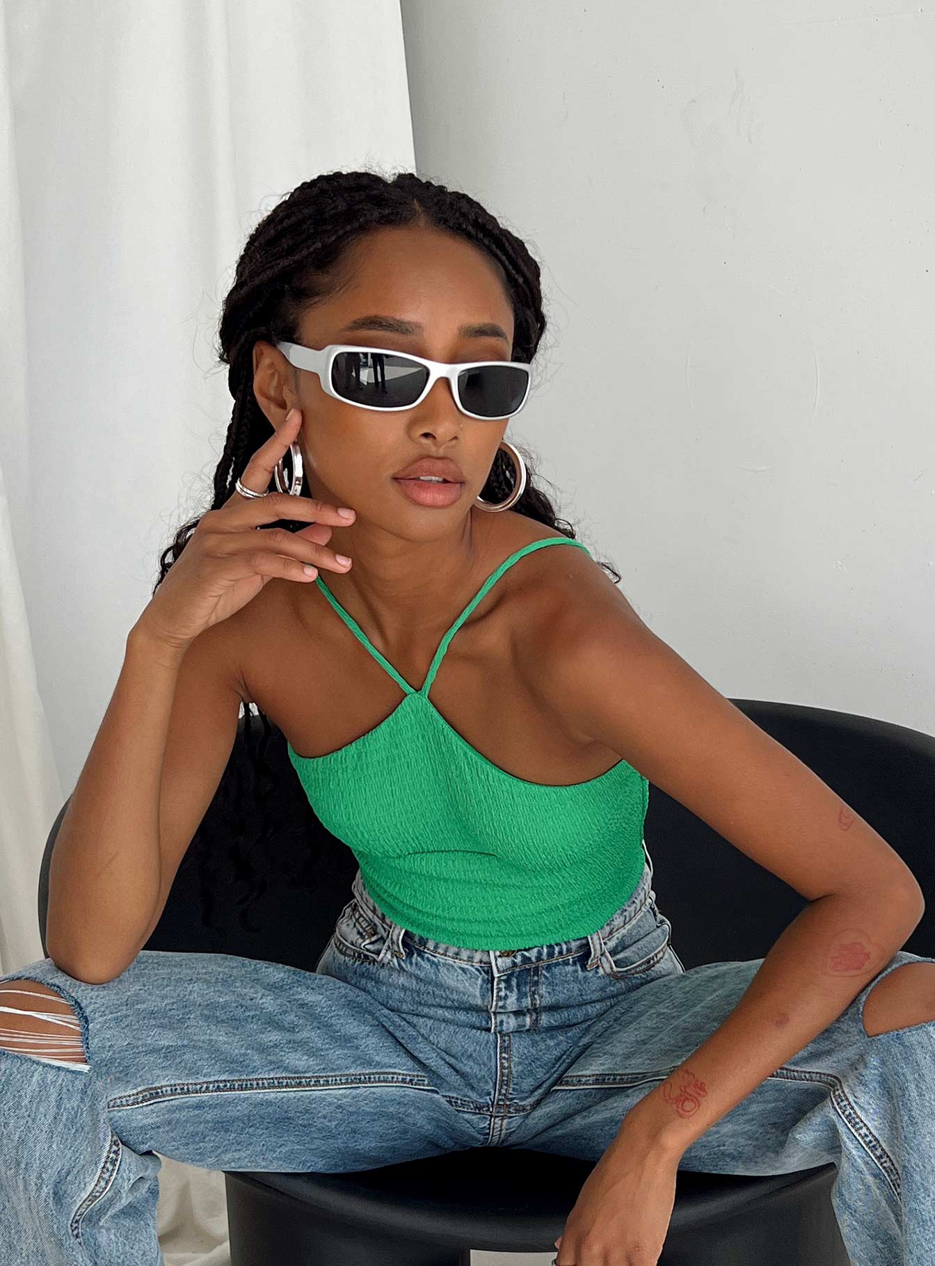 side view of model wearing Princess Polly Niles Bodysuit Green Sleeveless Asymmetric Neckline 