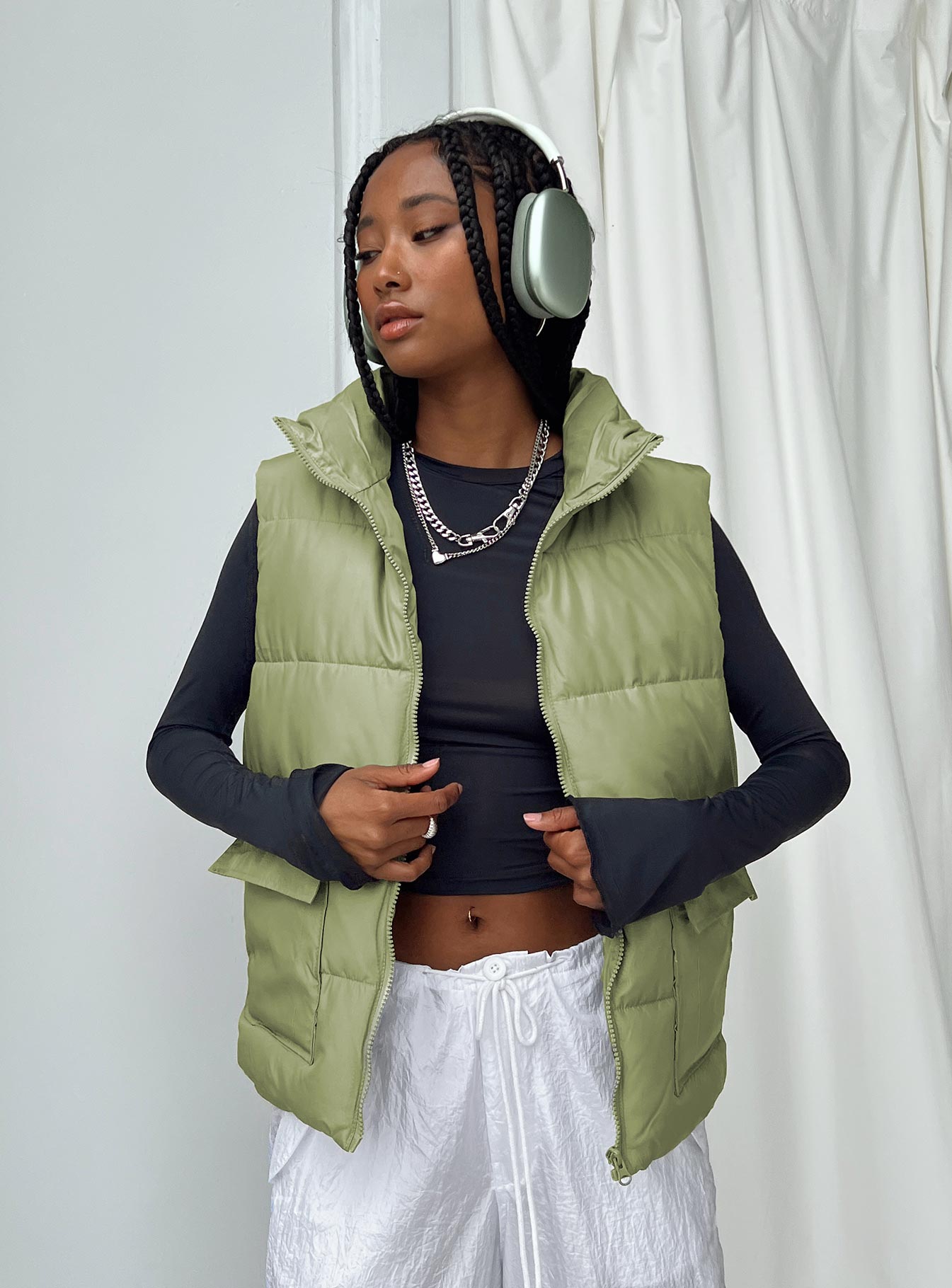 Puffer vest High neck Zip front fastening Twin hip pockets Non-stretch