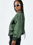 Jacket Satin material Zip fastening at front Twin hip pockets Elasticated waistband & cuffs Non-stretch