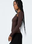 Long sleeve top Ribbed material Cut out detail at shoulder Longline design